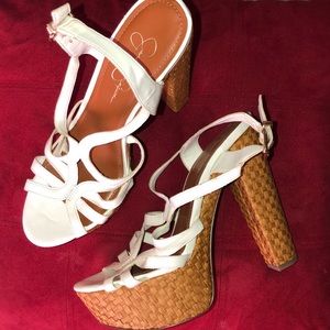 Jessica Simpson strapping white heel!